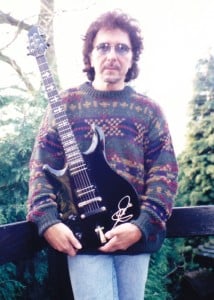 He doesn't always wear black, you know. But his Patrick Eggle guitars in the 90s featured Duncans.