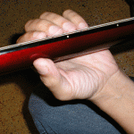 Notice the wrist is bent, but not locked.