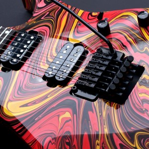 The Rick Hanes Avenix H-H in Candy Swirl. I have never before felt such an urge to lick a guitar.