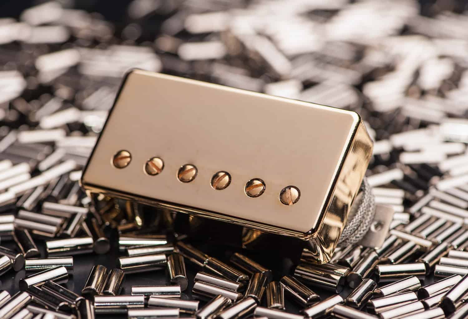 Seth Lover gold pickup set on a bed of magnets